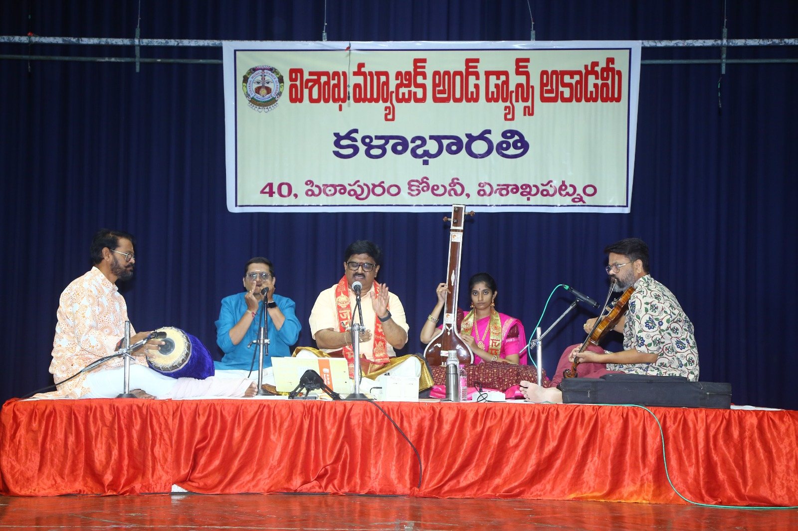 Dr. Tyagaraj singing in a Carnatic concert ensemble