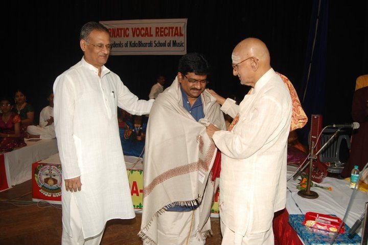 Dr. Tyagaraj being felicitated by his guru